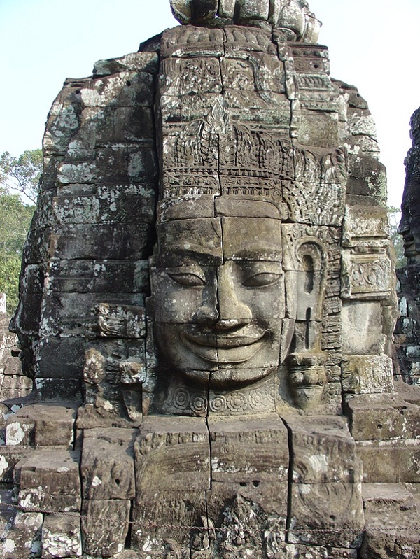 The gigantic face on one side of the tower in the Banteay Chhmar Temple