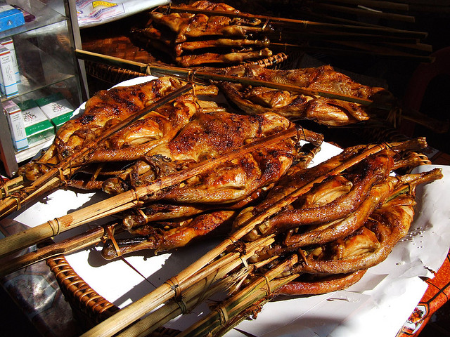 Grilled Savanakhet chicken is one of the most attractive street foods of Laos