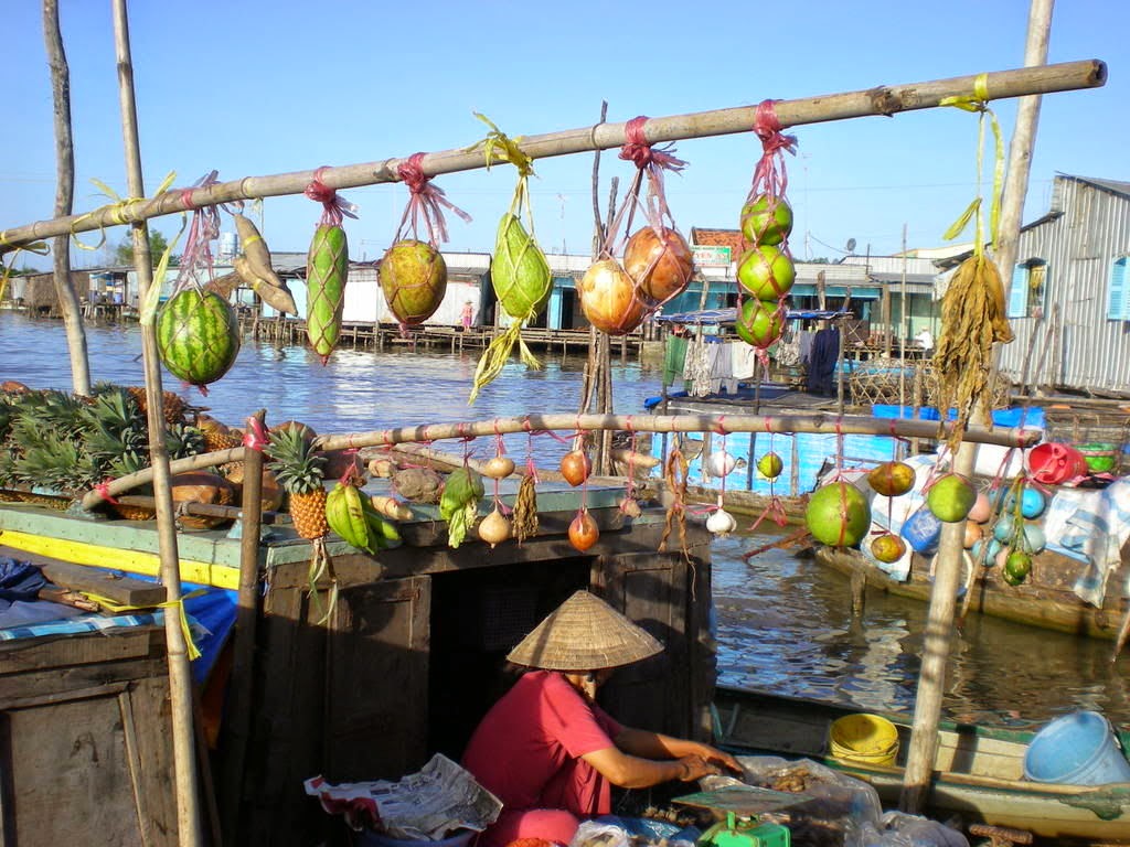 A boat selling vegetable in floating market