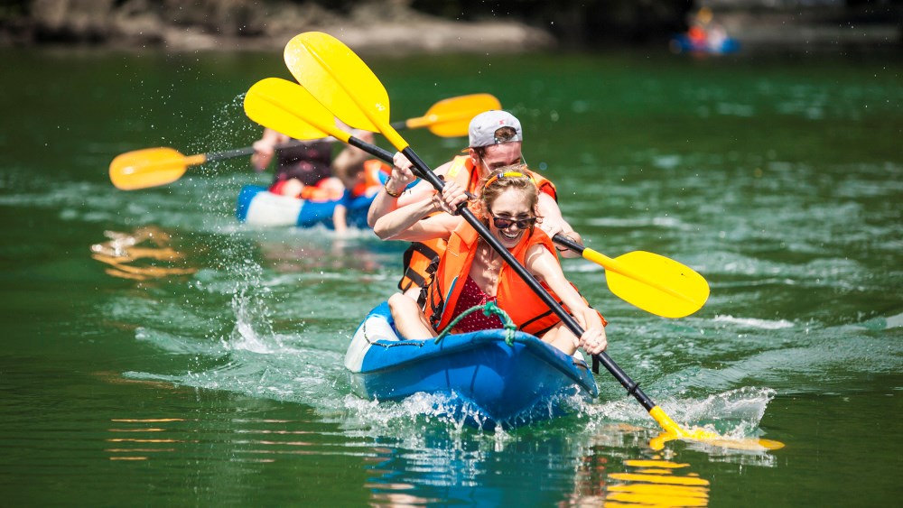 Tourists are enjoying the kayaking