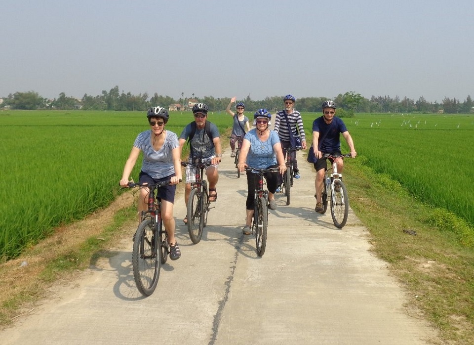 Tourists are excited about riding through rural areas in Hoi An