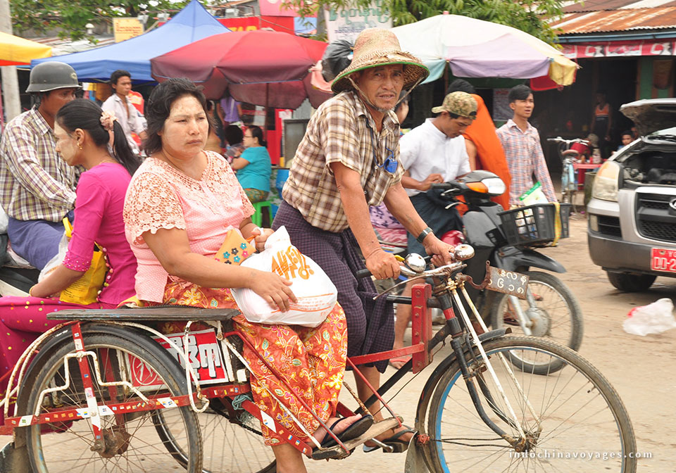 Men and women with Thanaka on their faces