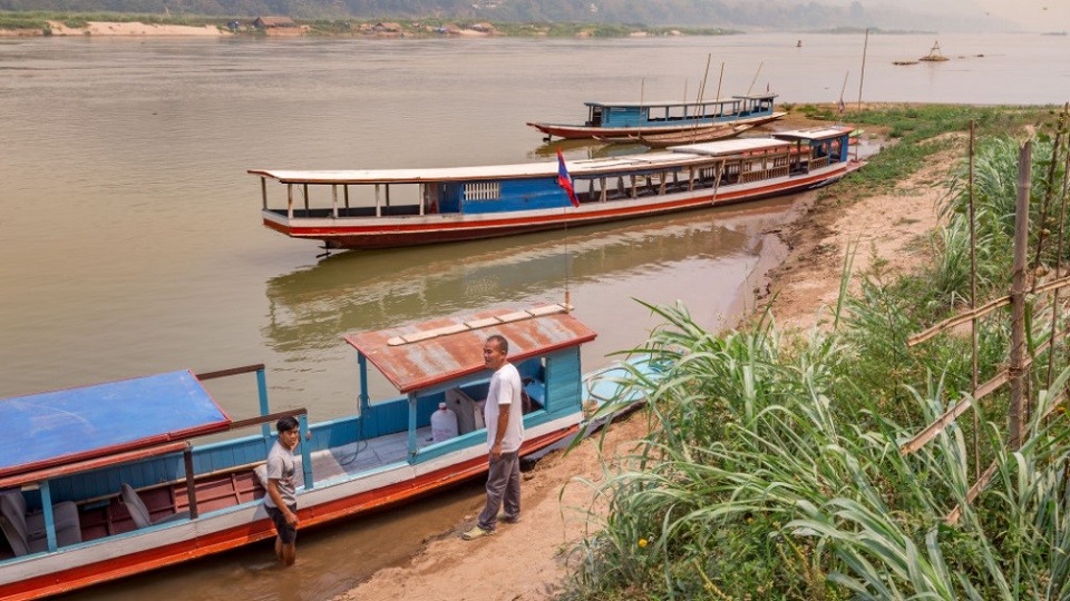 Boats to Pak Ou cave