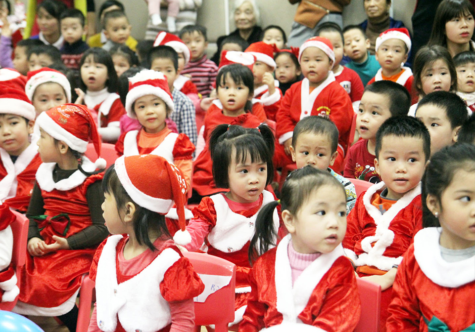 Tiny Santas in Vietnam