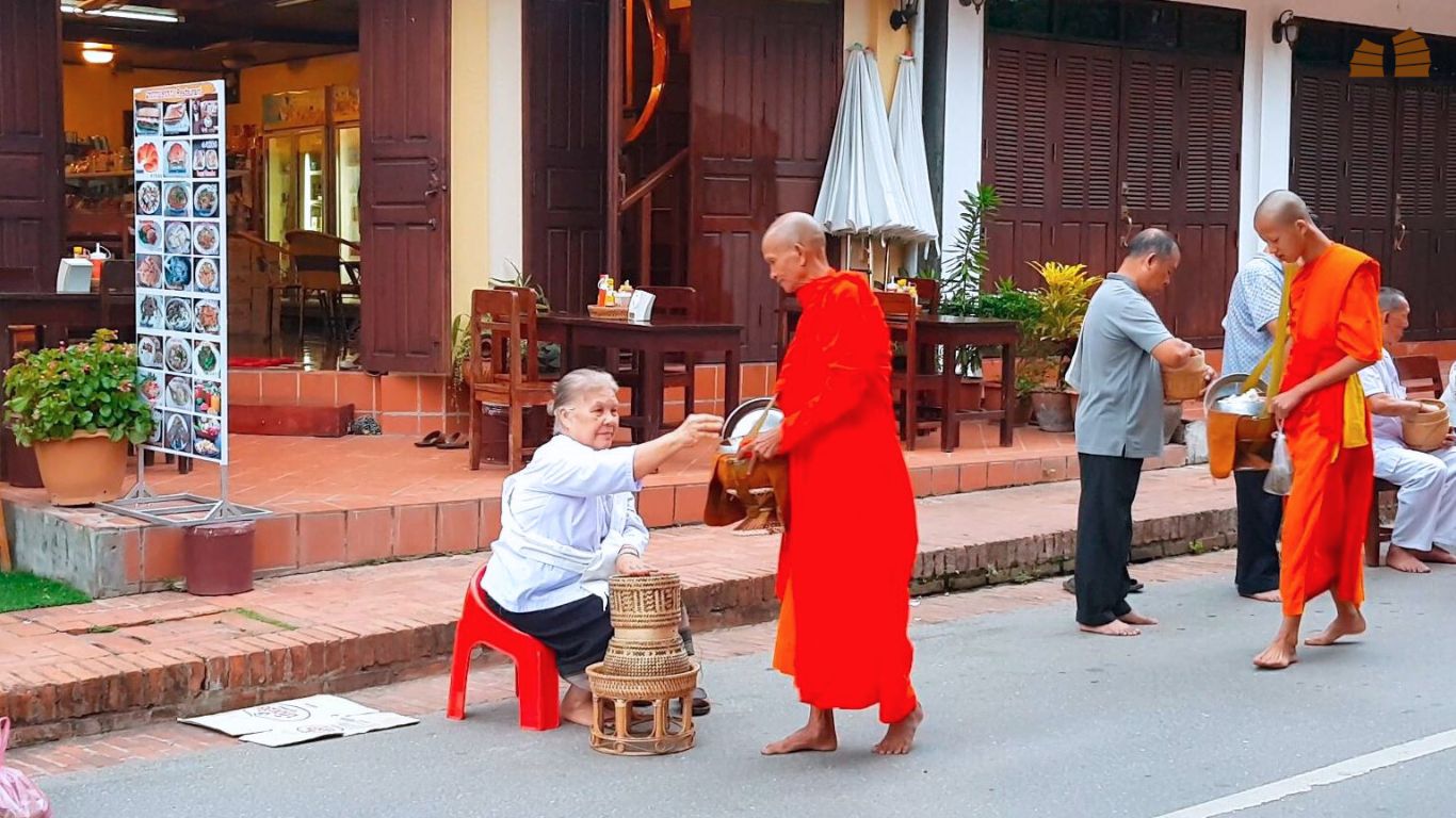 alms giving in Luang Prabang