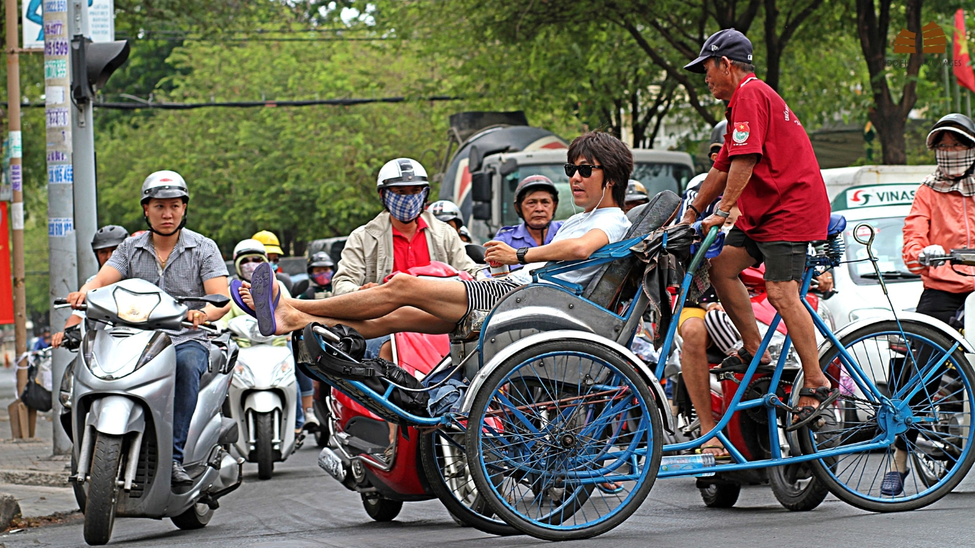 Motorbike and cyclo are common in Vietnam