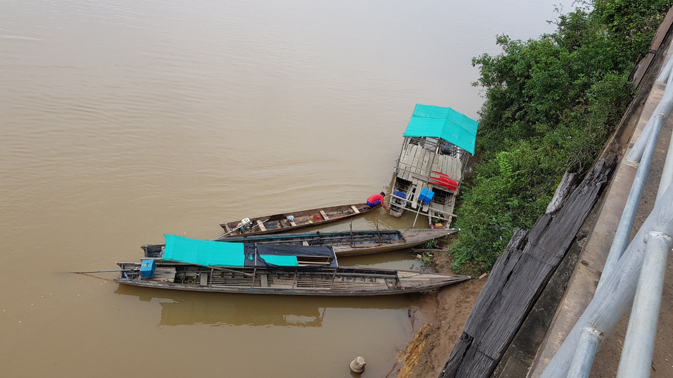 Boat in the tranquil MekongRiver in Laos