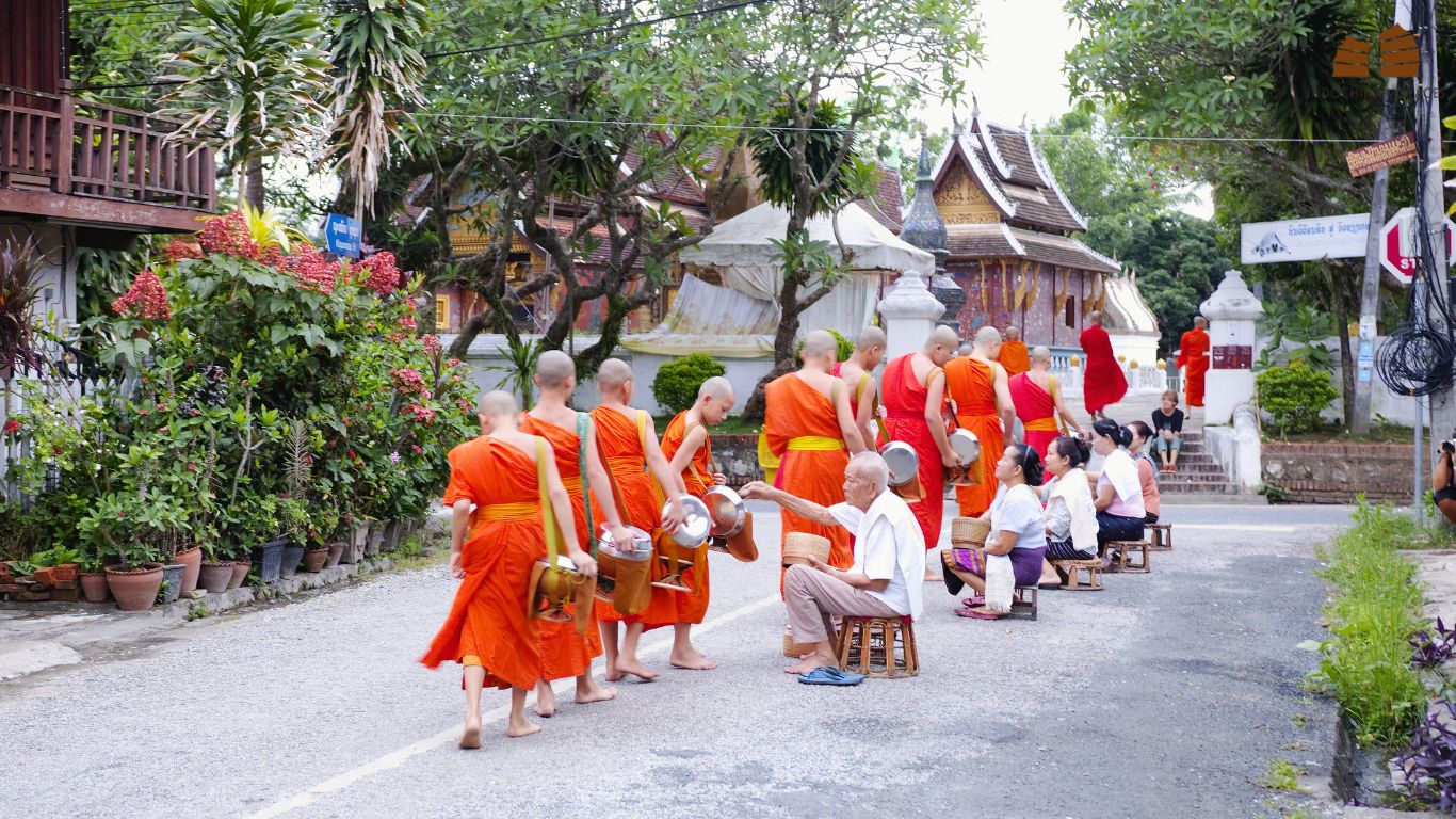 Alms giving ceremony in the morning in Luang Prabang