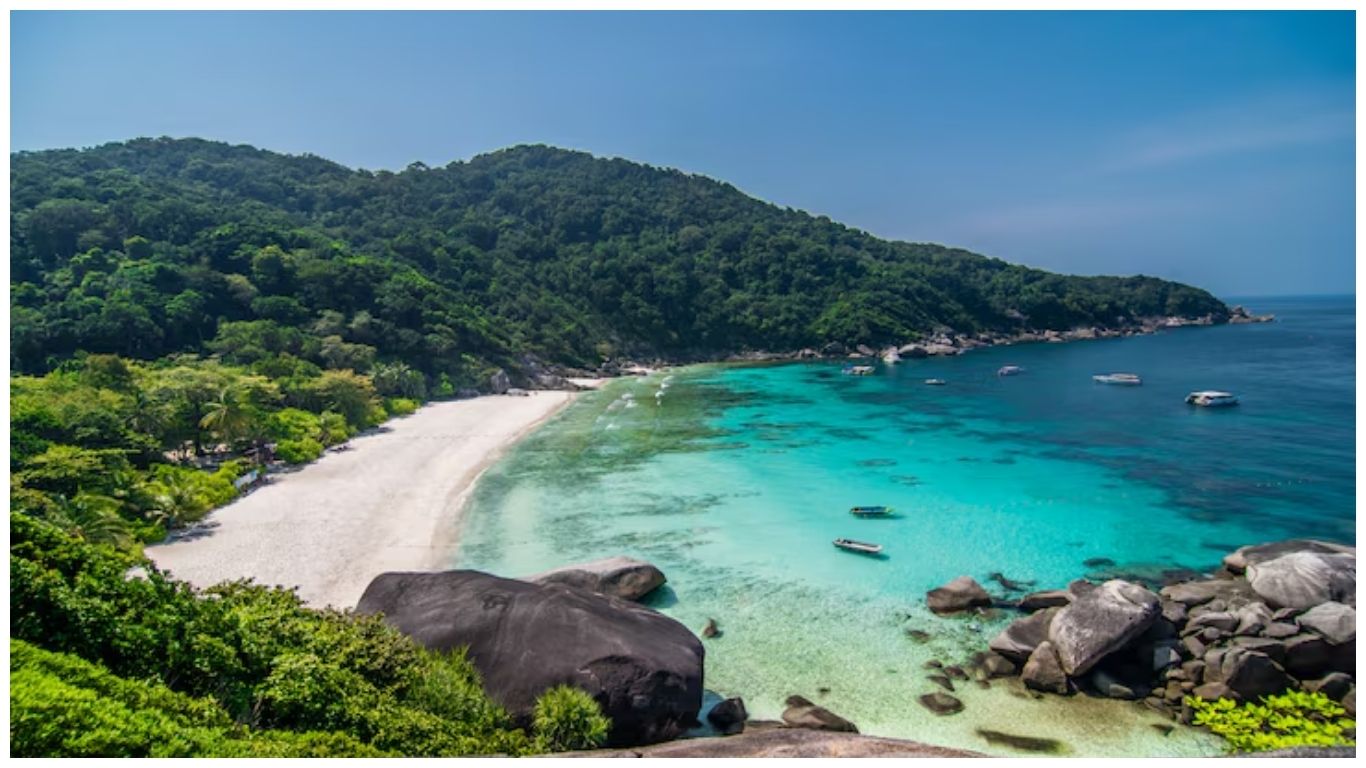 A stunning tropical beach on Koh Samui with turquoise waters and white sand, highlighting the best coastal destination for Thailand in July