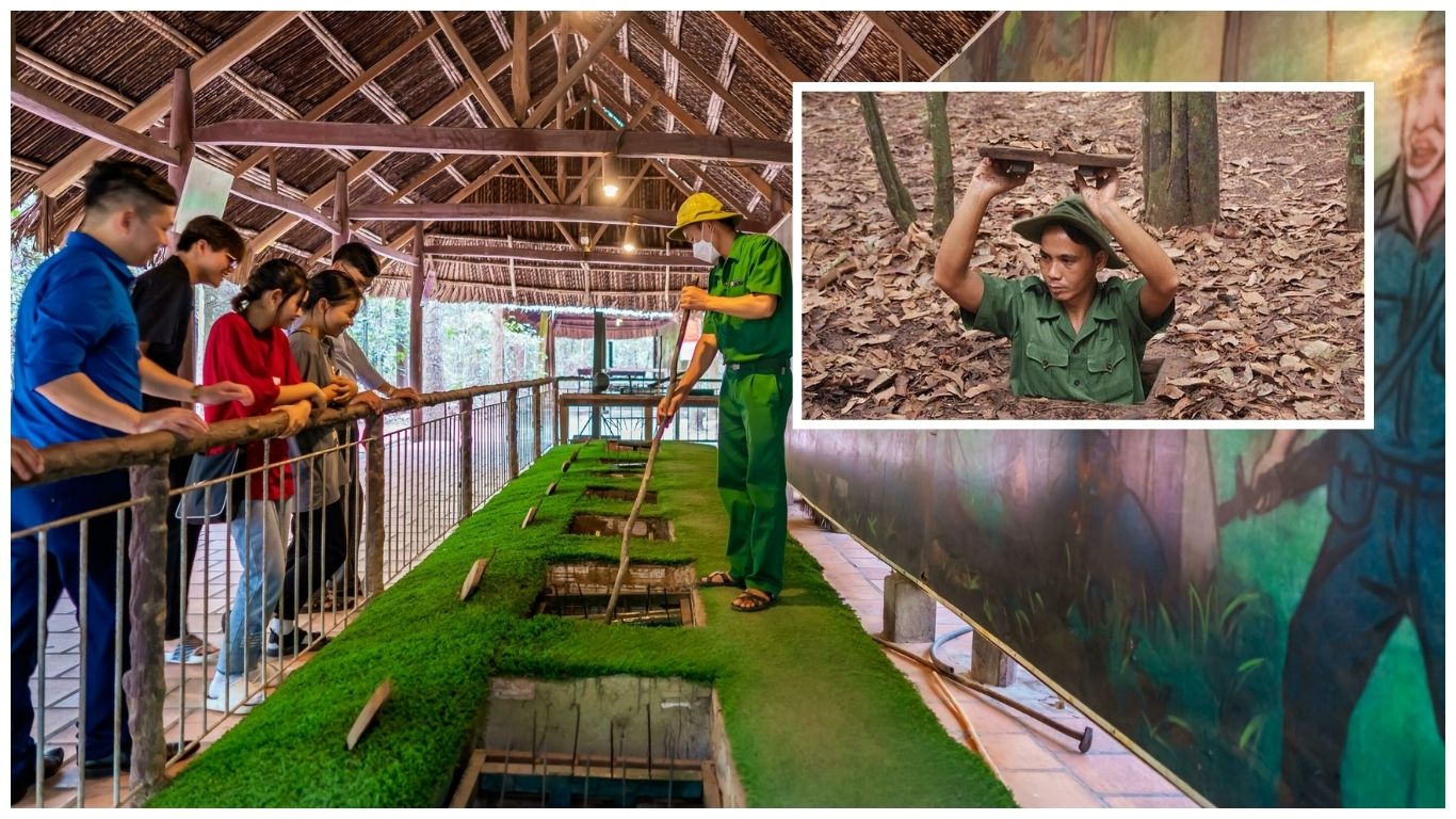 Tourists watching a demonstration of trapdoors and a soldier emerging from a hidden entrance at Cu Chi Tunnels, a popular choice for day trips from Saigon