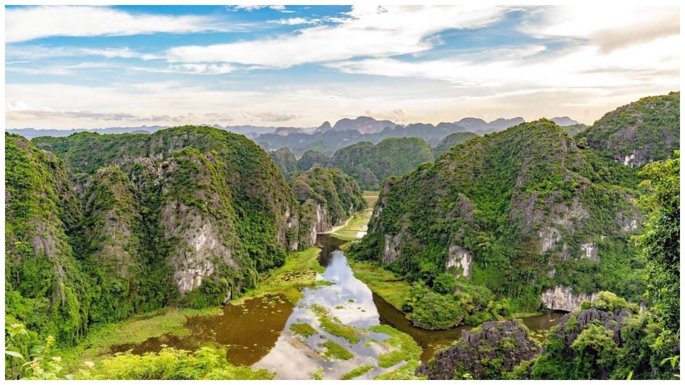 Stunning limestone karst mountains and river scenery, a must-visit destination for those planning day trips from Hanoi, Vietnam