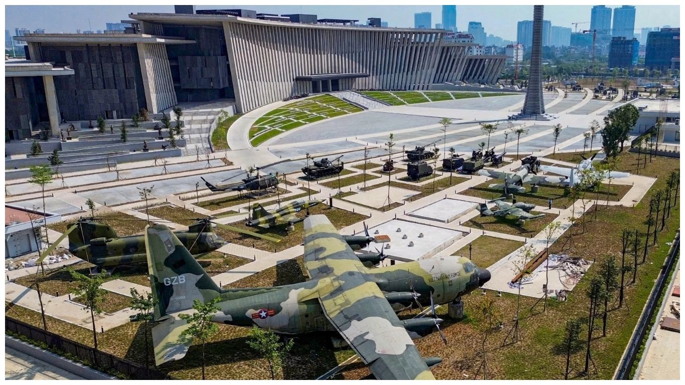 An outdoor display of historical military aircraft and tanks at the Vietnam Military History Museum, perfect for educational day trips from Hanoi, Vietnam